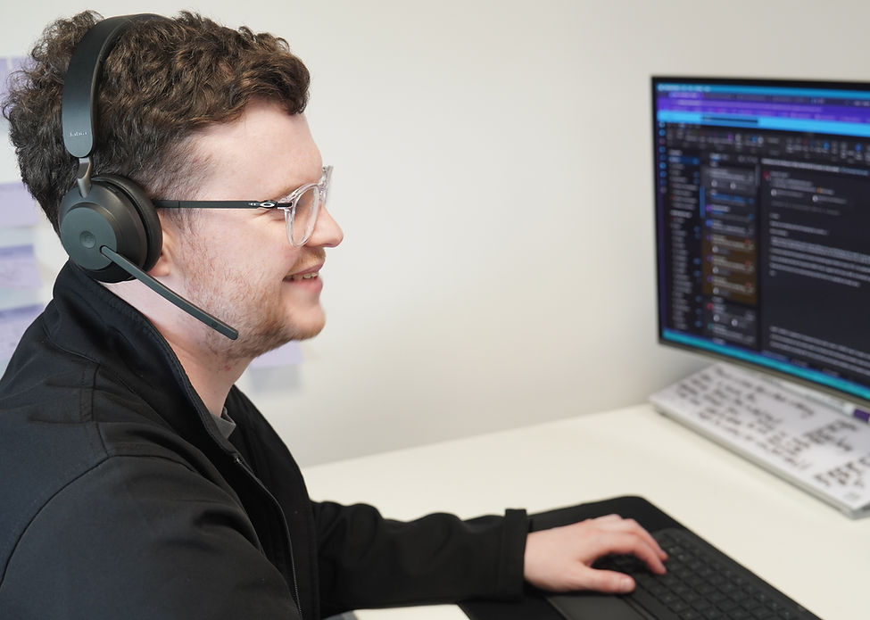 Snap IT security engineer reviewing live monitoring dashboards